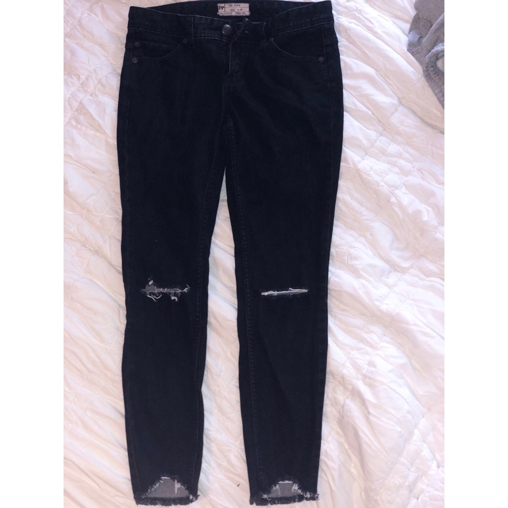 Black free people jeans with small rips